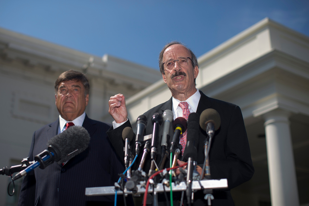 FILE - Rep. Eliot Engel, D-N.Y., ranking Democrat on the House Foreign Relations Committee, right, accompanied by Rep. Dutch Ruppersberger, D-Md., ranking Democrat on the House Intelligence Committee, speaks to the reporeters outside the West Wing of the White House in Washington, Tuesday, Sept. 3, 2013, following a meeting between President Barack Obama and Congressional leaders to discuss the situation in Syria. (AP Photo/Carolyn Kaster, File)