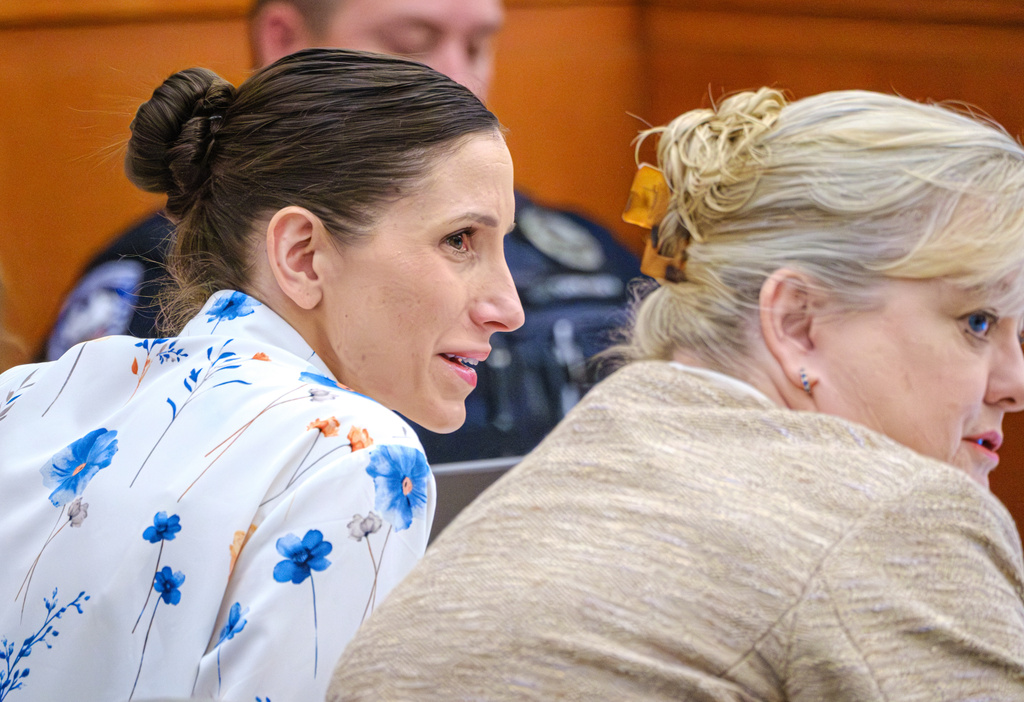 Defendant Kouri Richins, left, accused of poisoning her husband in March 2022, listens to closing arguments in Third District Court, Monday, March 16, 2026, in Park City, Utah. (David Jackson/Pool Photo via AP)