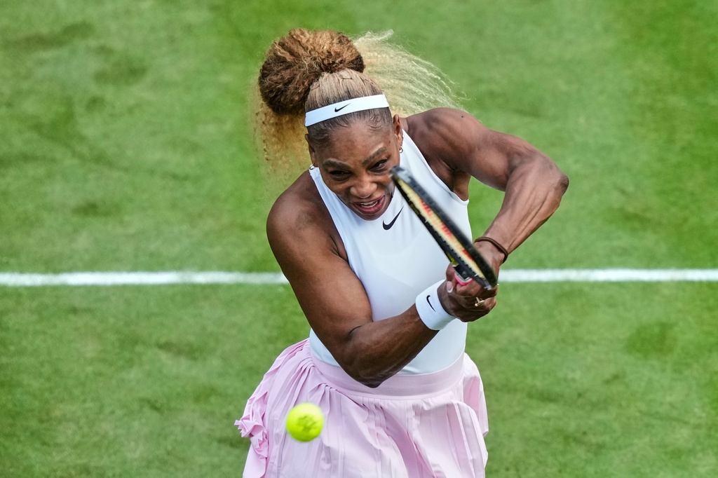 Serena Williams of the U.S. returns the ball as she and Czech Republic's Karolina Muchova play during their round of 16 doubles match against New Zealand's Erin Routliffe and Mexico's Giuliana Olmo during the WTA 500 Berlin Open tennis tournament at Steffi Graf Stadium, in Berlin, Germany, Tuesday, June 16, 2026. (AP Photo/Ebrahim Noroozi)