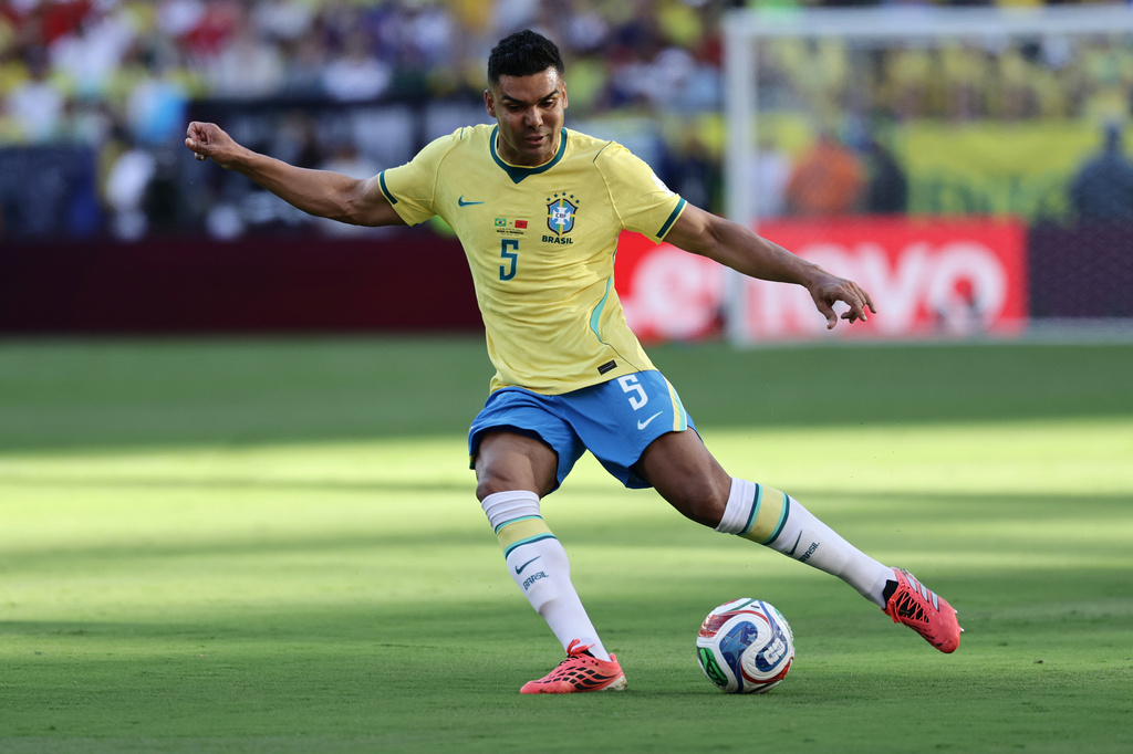 FILE - Brazil's Casemiro (5) kicks the ball in the first half during the World Cup Group C soccer match between Brazil and Morocco in East Rutherford, N.J., near New York, Saturday, June 13, 2026. (AP Photo/Adam Hunger, File(