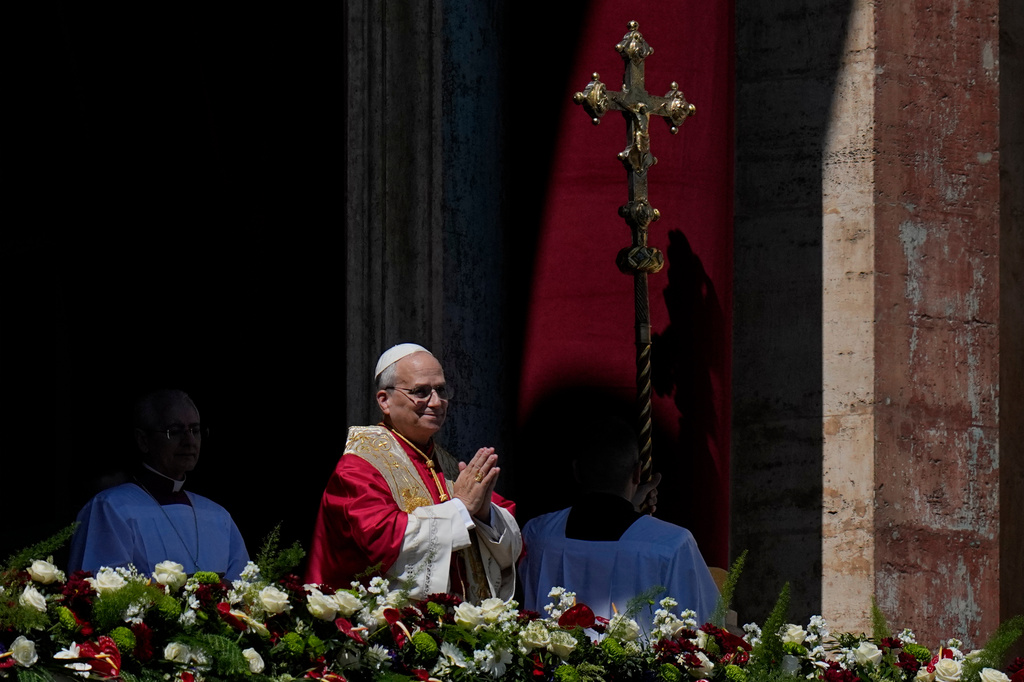Pope Leo XIV addresses the faithful after delivering the Urbi et Orbi blessing - Latin for "to the city of Rome and to the world" - from the central loggia of St. Peter's Basilica at the end of Easter Mass he presided over in St. Peter's Square at the Vatican, Sunday, April 5, 2026. (AP Photo/Alessandra Tarantino)