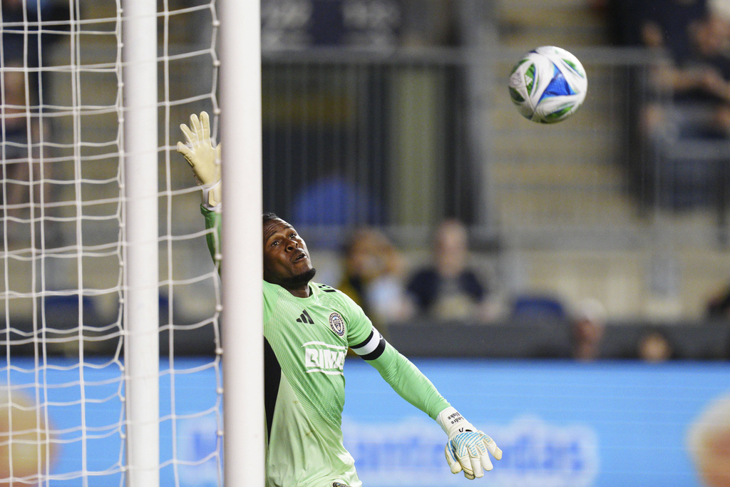 Philadelphia Union goalkeeper Andre Blake is unable to make a save on a goal by Toronto FC's Deandre Kerr in stoppage time during the second half of an MLS soccer match, Saturday, Aug. 9, 2025, in Chester, Pa. (AP Photo/Derik Hamilton)