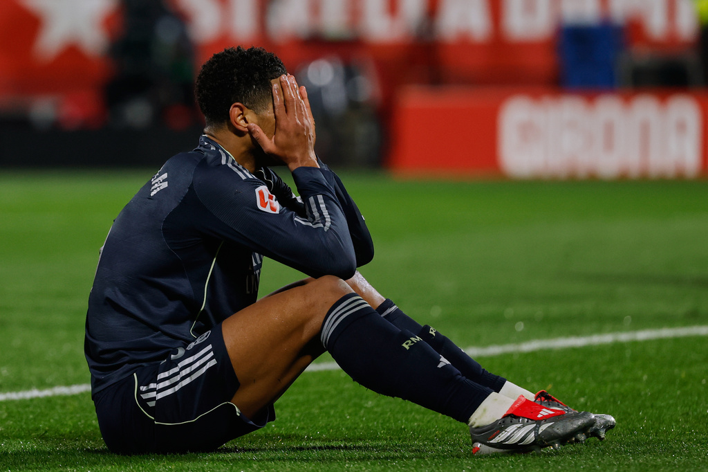 Real Madrid's Jude Bellingham reacts during a Spanish La Liga soccer match between Girona and Real Madrid, in Girona, Spain, Sunday, Nov. 30, 2025. (AP Photo/Joan Monfort)