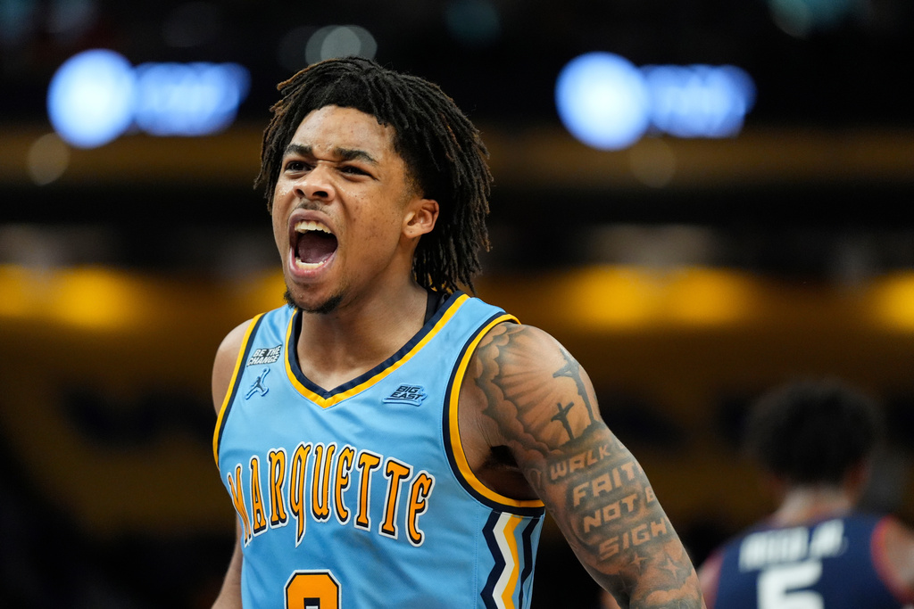 Marquette's Nigel James Jr. reacts during the second half of an NCAA college basketball game against UConn, Saturday, March 7, 2026, in Milwaukee. (AP Photo/Aaron Gash)