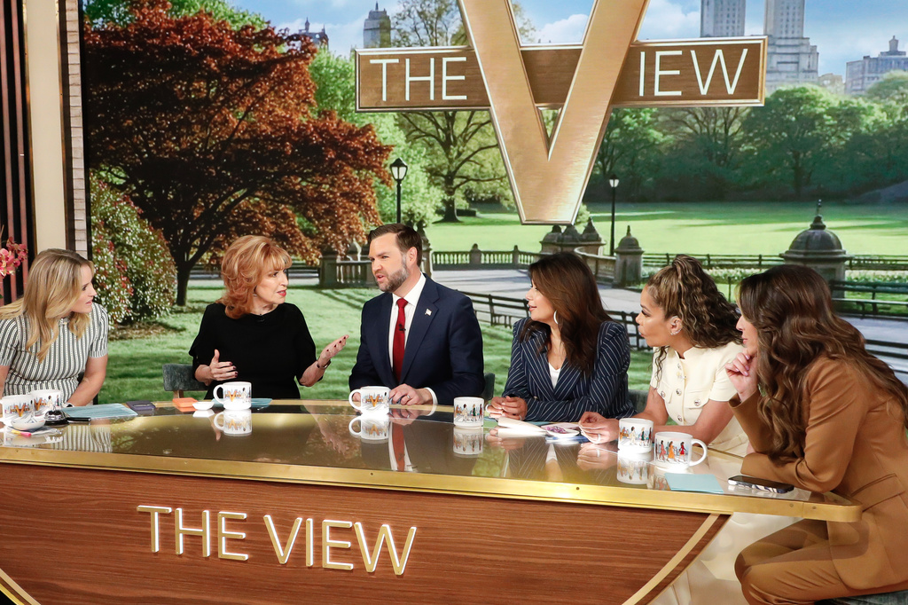 This image released by ABC shows Vice President JD Vance, third from left, with co-hosts, from left, Sara Haines, Joy Behar, Ana Navarro, Sunny Hostin and Alyssa Farah Griffin during an appearance on "The View" in New York on Tuesday, June 16, 2026. (Lou Rocco/ABC via AP)