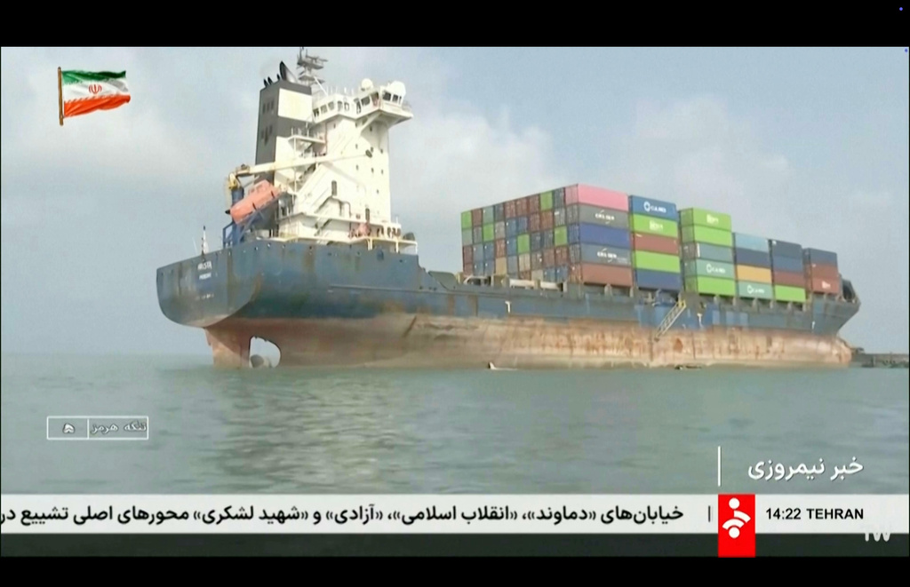 This frame grab of footage aired Wednesday, July 1, 2026, by Iranian state television shows a vessel that ran aground in the Strait of Hormuz. (Iranian state television via AP)