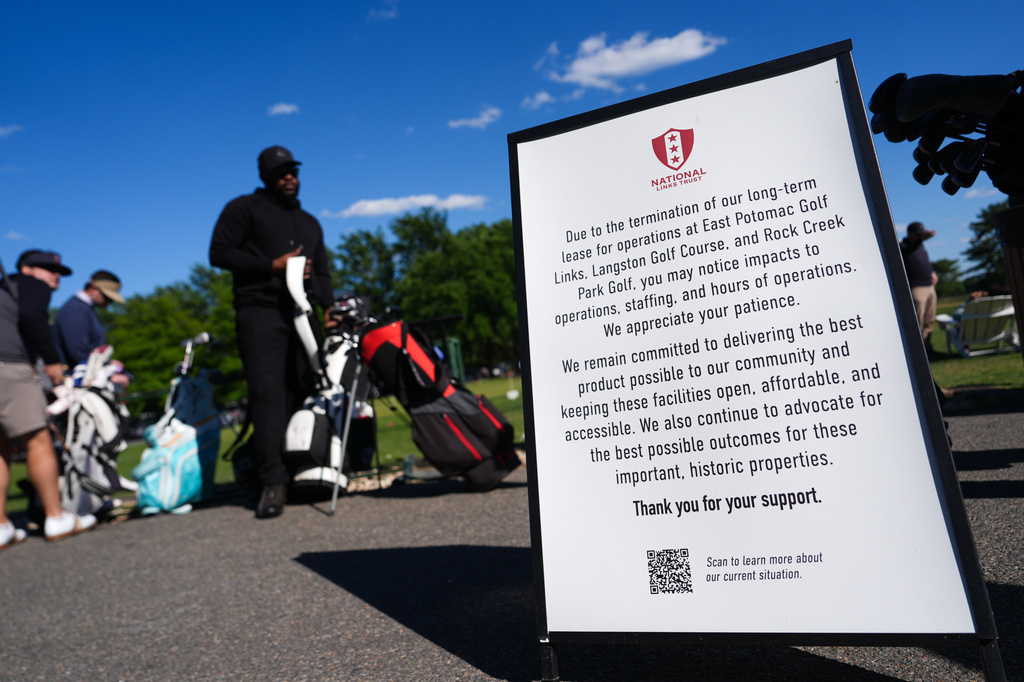 A sign announcing possible changes in operations is seen at East Potomac Golf Course, Sunday, May 3, 2026, in Washington. (AP Photo/Julia Demaree Nikhinson)