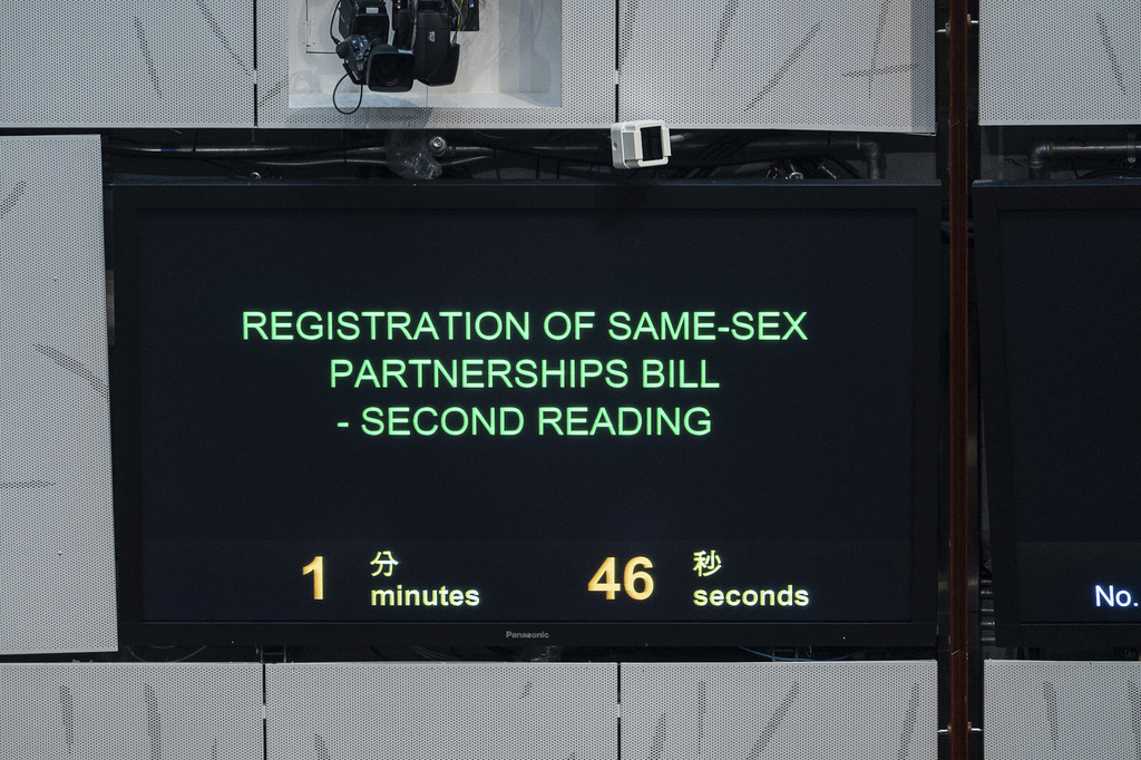 Lawmakers resume debate on a government bill that proposed to grant recognition to same-sex in Hong Kong, Wednesday, Sept. 10, 2025. (AP Photo/Chan Long Hei)