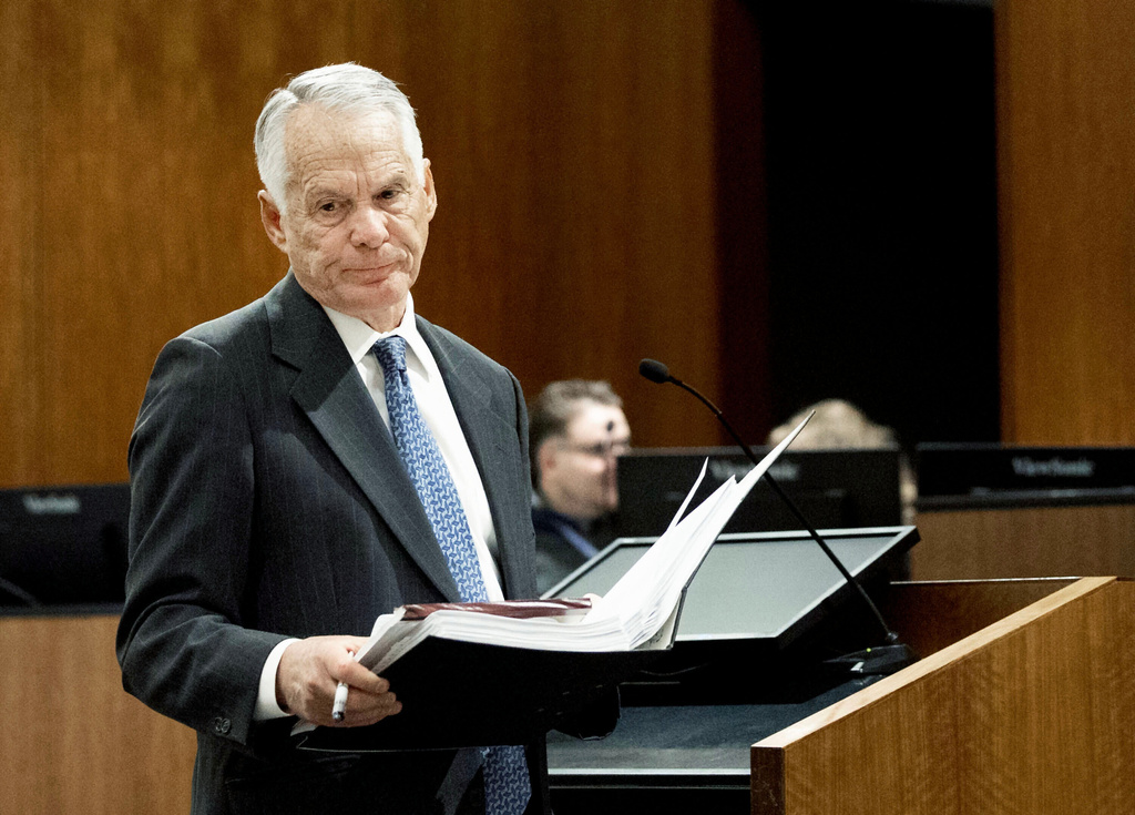 Attorney Michael Burt returns to his seat after addressing Fourth District Court Judge Tony Graf during a hearing for Tyler Robinson, accused in the fatal shooting of conservative activist Charlie Kirk, in 4th District Court, on Friday, March. 13, 2026, in Provo, Utah. (Laura Seitz /The Deseret News via AP, Pool)