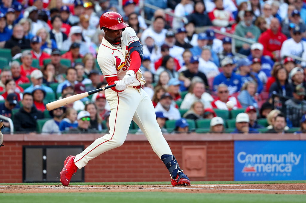 St. Louis Cardinals' Jordan Walker hits a single during the first inning of a baseball game against the Los Angeles Dodgers Saturday, May 2, 2026, in St. Louis. (AP Photo/Scott Kane)