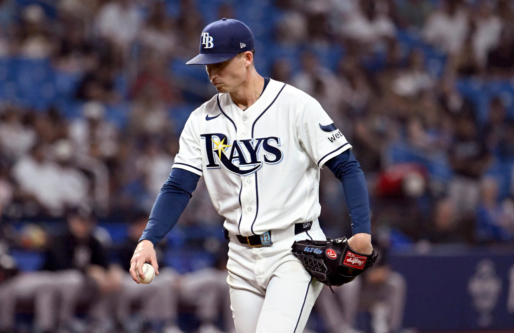 Tampa Bay Rays pitcher Griffin Jax waits for the next batter after giving up a three-run hime run to New York Yankees' José Caballero during the fifth inning of a baseball game Monday, July 6, 2026, in St. Petersburg, Fla. (AP Photo/Jason Behnken)