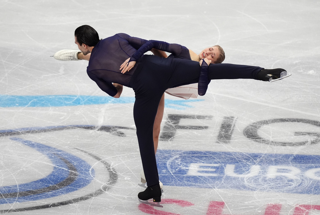 Germany's Minerva Fabienne Hase and Nikita Volodin compete during the Pairs Free Skating on day two of the ISU European Figure Skating Championships in Sheffield, England, Thursday, Jan. 15, 2026. (Mike Egerton/PA via AP)