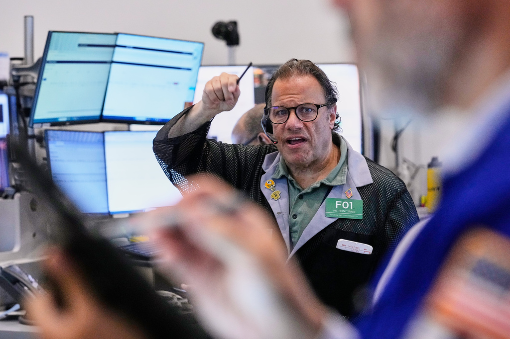 Options trader Anthony Spina works on the floor of the New York Stock Exchange, Friday, May 22, 2026. (AP Photo/Richard Drew)