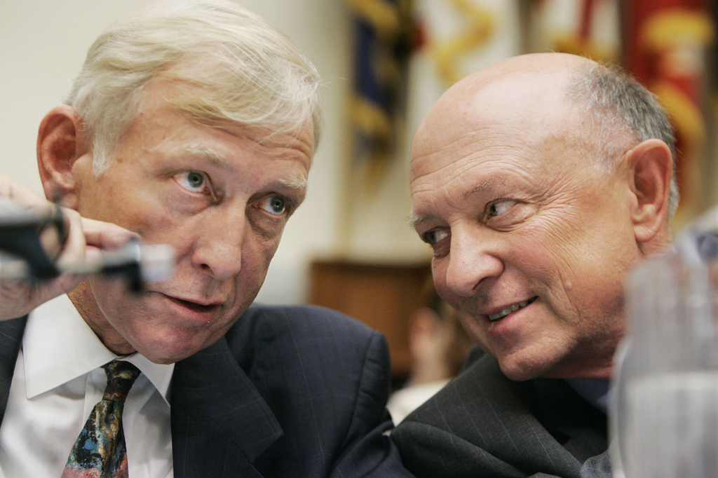FILE - R. James Woolsey, former Director of the Central Intelligence Agency, right, and Richard D'Amato, chairman, U.S.- China Economic and Security Review Commission, confer as they testify before the House Armed Services Committee on Capitol Hill, during a hearing on July 13, 2005, in Washington. (AP Photo/Manuel Balce Ceneta, File)