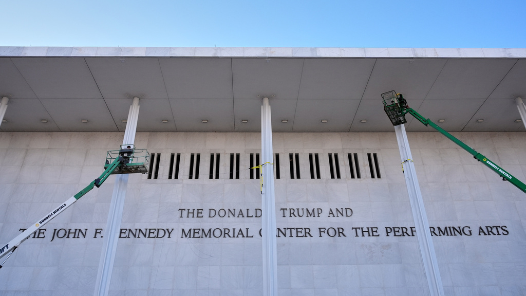 New signage, The Donald J. Trump and The John F. Kennedy Memorial Center For The Performing Arts, is unveiled on the Kennedy Center, Friday, Dec. 19, 2025, in Washington. (AP Photo/Jacquelyn Martin)