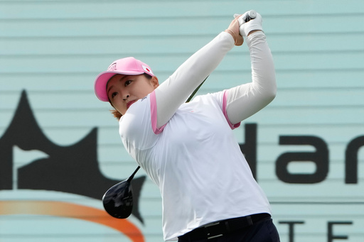 Mao Saigo of Japan hits her tee shot on the 1st hole during the pool B match against the World Team for the LPGA International Crown golf tournament at the New Korea Country Club in Goyang, South Korea, Thursday, Oct. 23, 2025. (AP Photo/Ahn Young-joon) Mao Saigo of Japan hits her tee shot on the 1st hole during the pool B match against the World Team for the LPGA International Crown golf tournament at the New Korea Country Club in Goyang, South Korea, Thursday, Oct. 23, 2025. (AP Photo/Ahn Young-joon)