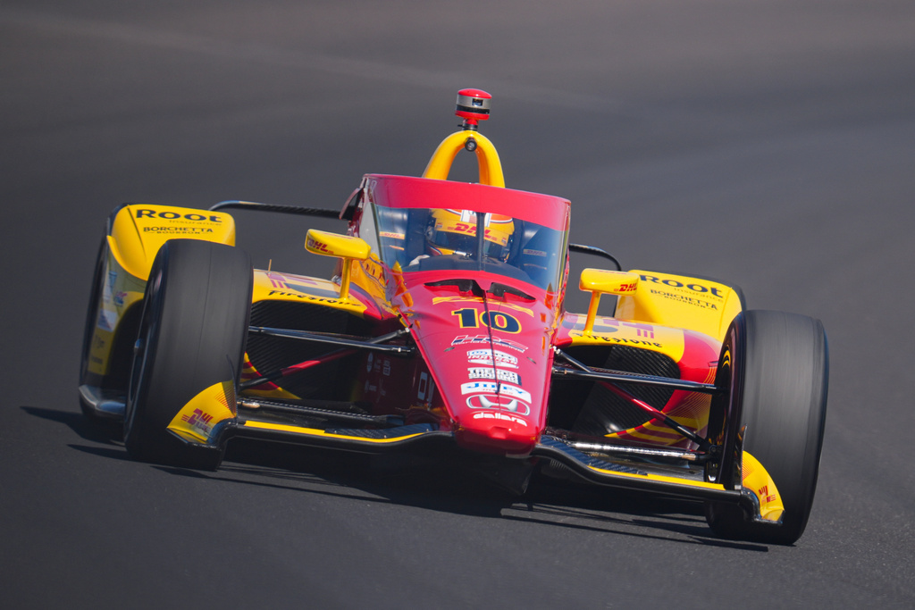 FILE - Alex Palou, of Spain, drives through the third turn during qualifications for the Indianapolis 500 auto race at Indianapolis Motor Speedway in Indianapolis, Sunday, May 18, 2025. (AP Photo/Michael Conroy, File)