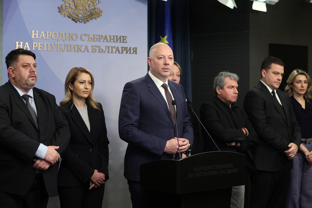 Bulgarian Prime Minister Rosen Zhelyazkov announces that Bulgaria's government resigns following mass protests, at the Bulgarian Parliament in Sofia, Bulgaria, Thursday, Dec. 11, 2025. (Bulgarian News Agency via AP)