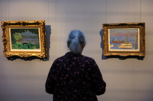A visitor looks on the painting Lagoon on the Seine, left, and White Boots from Pierre Bonnard at a press preview for the exhibition "The Scharf Collection: Goya – Monet – Cezanne – Bonnard – Grosse" at the Alte Nationalgalerie museum in Berlin, Wednesday, Oct. 22, 2025. (AP Photo/Maryam Majd) A visitor looks on the painting Lagoon on the Seine, left, and White Boots from Pierre Bonnard at a press preview for the exhibition "The Scharf Collection: Goya – Monet – Cezanne – Bonnard – Grosse" at the Alte Nationalgalerie museum in Berlin, Wednesday, Oct. 22, 2025. (AP Photo/Maryam Majd)