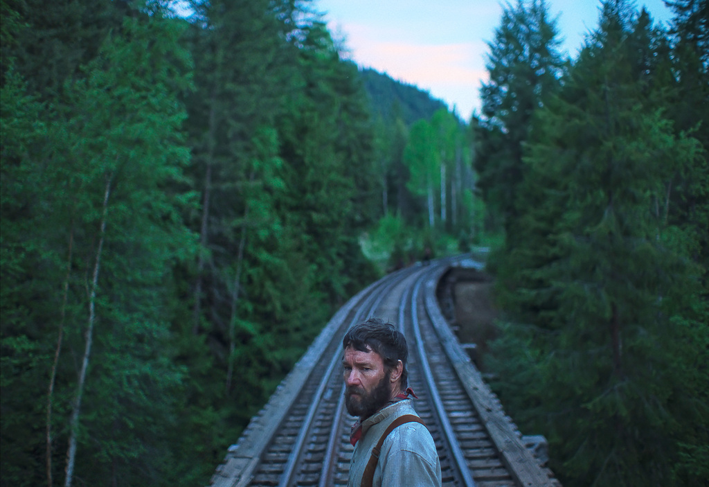 This image released by Netflix shows Joel Edgerton in a scene from "Train Dreams." (Netflix via AP)