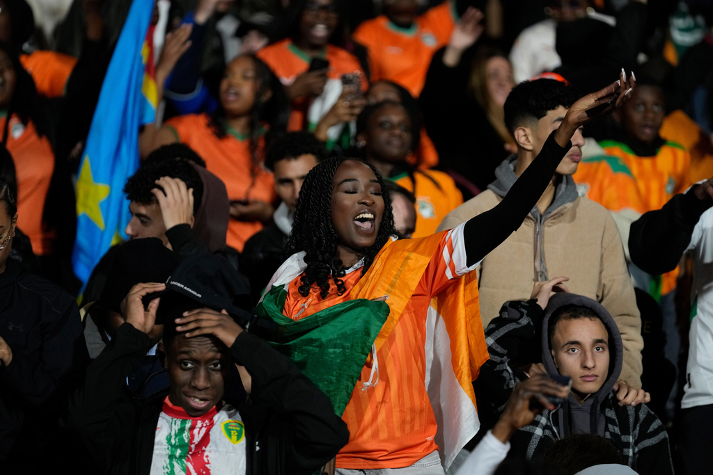 Ivory Coast fans cheer their team during the Africa Cup of Nations group F soccer match between Gabon and Ivory Coast, in Marrakech, Morocco, Wednesday, Dec. 31, 2025. (AP Photo/Themba Hadebe)