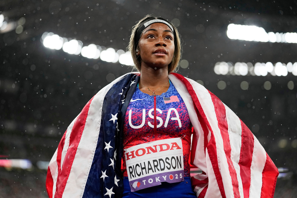 FILE - United States' Sha'Carri Richardson looks on after winning the gold medal in the women's 4 X 100 meters relay at the World Athletics Championships in Tokyo, Sept. 21, 2025. (AP Photo/Matthias Schrader, File)