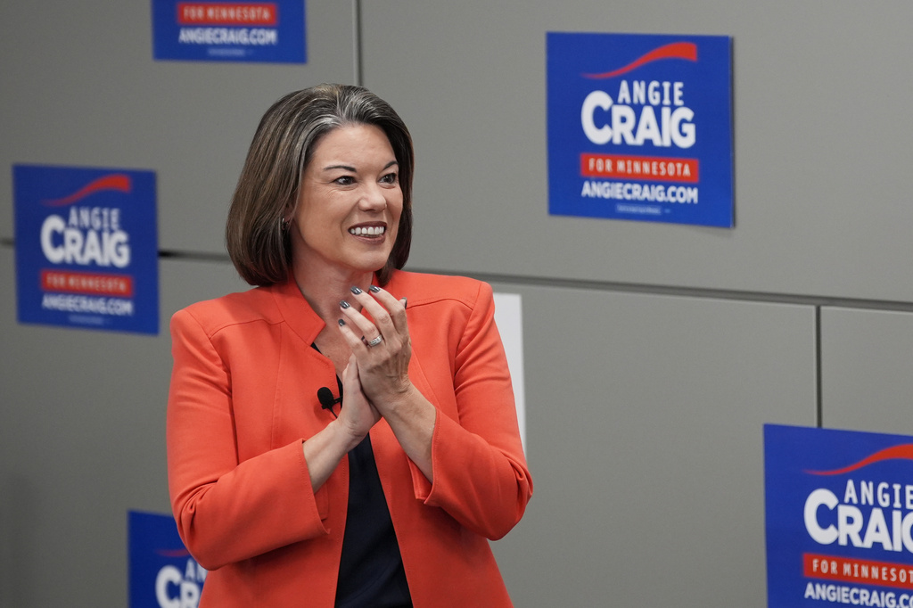 U.S. Rep. Angie Craig, D-Minn., candidate for U.S Senate, speaks to supporters during a canvassing event at SMART Sheet Metal Workers Local #10 headquarters, Monday, Aug. 10, 2026, in St. Paul, Minn. (AP Photo/Ellen Schmidt)
