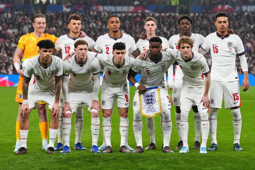 FILE - England players pose for a team photo before the start of the International friendly soccer match between England and Japan in London, Tuesday, March 31, 2026 . (AP Photo/Kirsty Wigglesworth, File)
