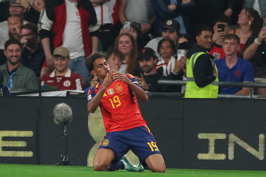 Spain's Lamine Yamal celebrates after scoring the opening goal during the Nations League Soccer match between England and Spain in London, Saturday, Sept. 26, 2026. (AP Photo/Ian Walton)