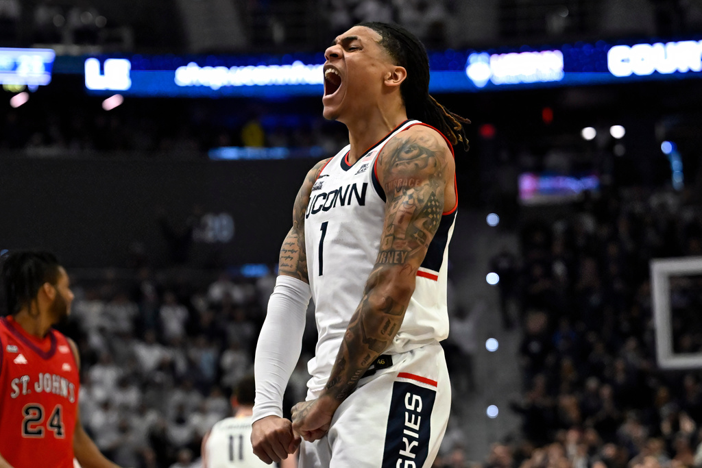 UConn guard Solo Ball reacts in the first half of an NCAA college basketball game against St. John's, Wednesday, Feb. 25, 2026, in Hartford, Conn. (AP Photo/Jessica Hill)