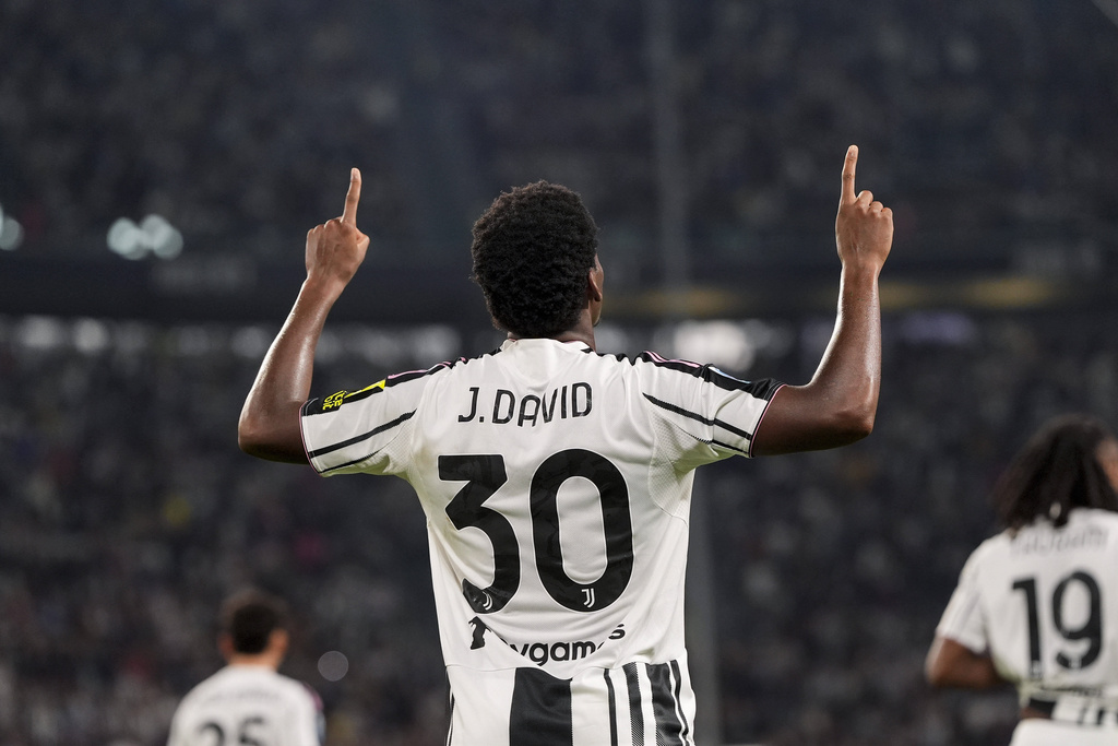 Juventus's Jonathan David celebrates after scoring the first goal for his team during the Italian Serie A soccer match between Juventus and Parma at the Juventus Stadium in Turin, Italy, Sunday, Aug. 24, 2025. (Fabio Ferrari/LaPresse via AP)