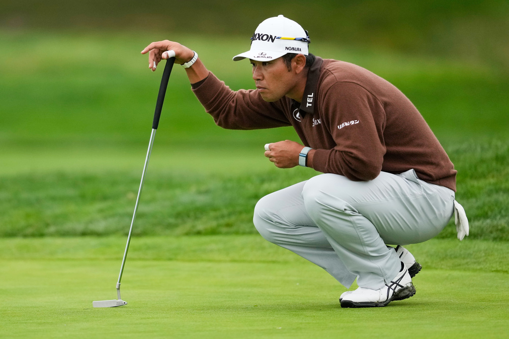 Hideki Matsuyama, of Japan, measures his putt on the second green at Pebble Beach Golf Links during the third round of the AT&amp;T Pebble Beach Pro-Am golf tournament in Pebble Beach, Calif., Saturday, Feb. 14, 2026, in Pebble Beach, Calif. (AP Photo/Godofredo A. V&aacute;squez)