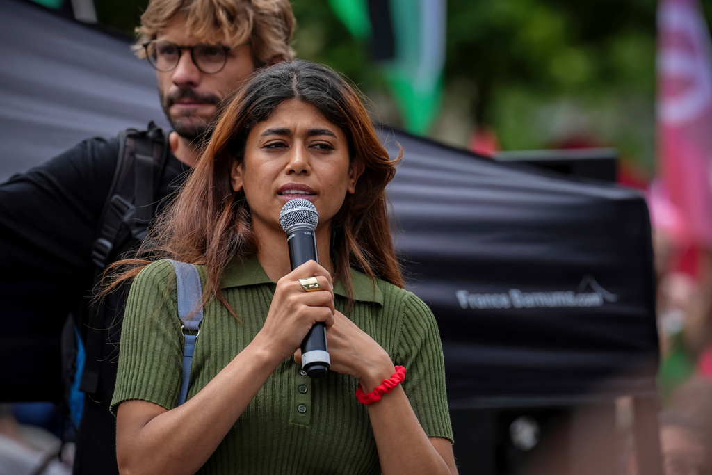 FILE- Member of European Parliament Rima Hassan delivers a speech during a pro-Palestinian demonstration called by several trade unions in Paris, France, Saturday, June 14, 2025. (AP Photo/Aurelien Morissard, File)