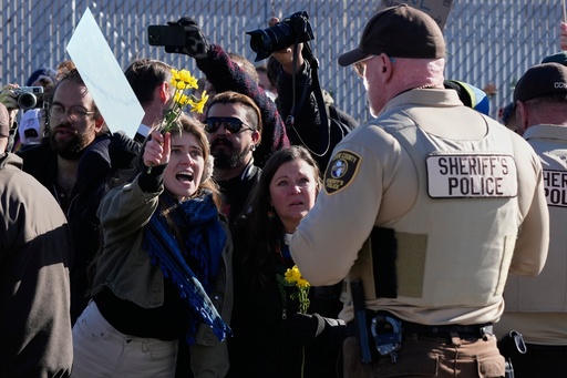 Protesters gather outside an ICE processing facility in Broadview, Ill, a suburb of Chicago, Friday, Oct. 24, 2025. (AP Photo/Nam Y. Huh) Protesters gather outside an ICE processing facility in Broadview, Ill, a suburb of Chicago, Friday, Oct. 24, 2025. (AP Photo/Nam Y. Huh)
