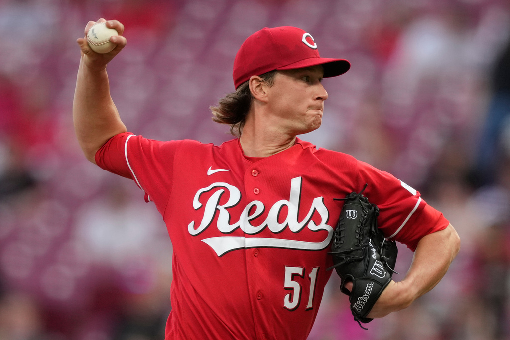 Cincinnati Reds pitcher Brady Singer throws during the third inning of a baseball game against the San Francisco Giants in Cincinnati, Tuesday, April 14, 2026. (AP Photo/Carolyn Kaster)