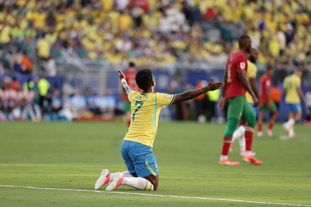 Brazil's Vinicius Junior (7) reacts after being tripped in the first half during the World Cup Group C soccer match between Brazil and Morocco in East Rutherford, N.J., near New York, Saturday, June 13, 2026. (AP Photo/Adam Hunger)