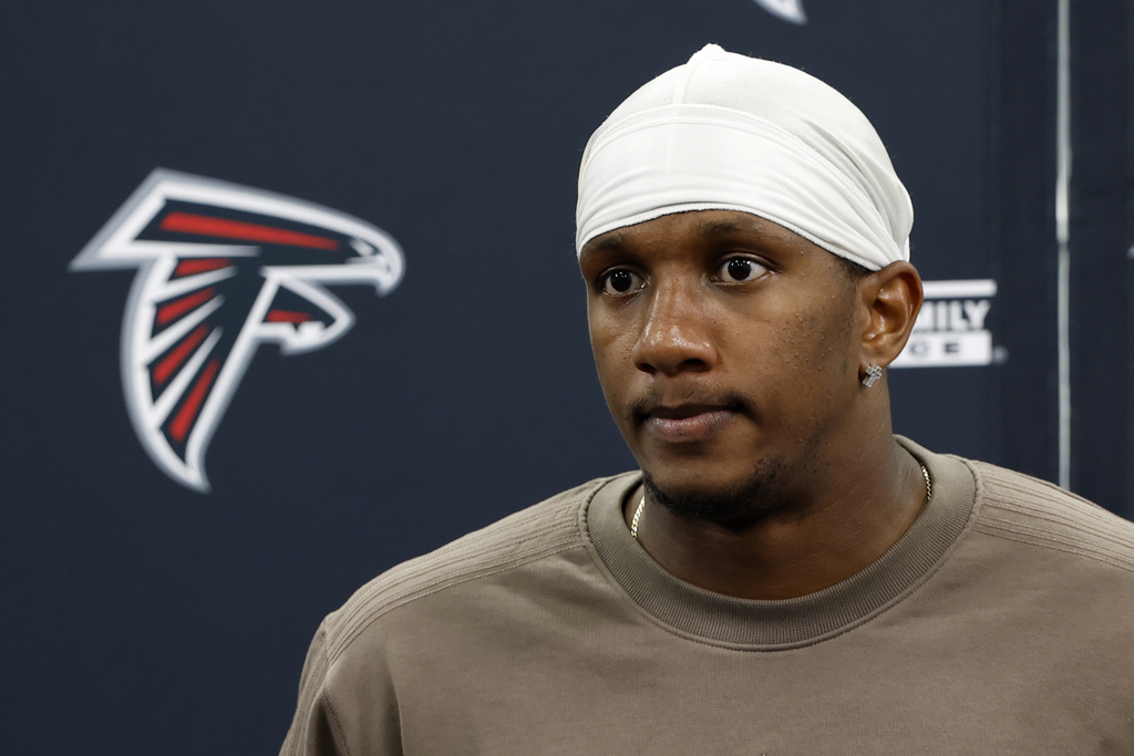 Atlanta Falcons quarterback Michael Penix Jr. speaks during a news conference after an NFL football game against the Carolina Panthers, Sunday, Sept. 21, 2025, in Charlotte, N.C. (AP Photo/Rusty Jones)