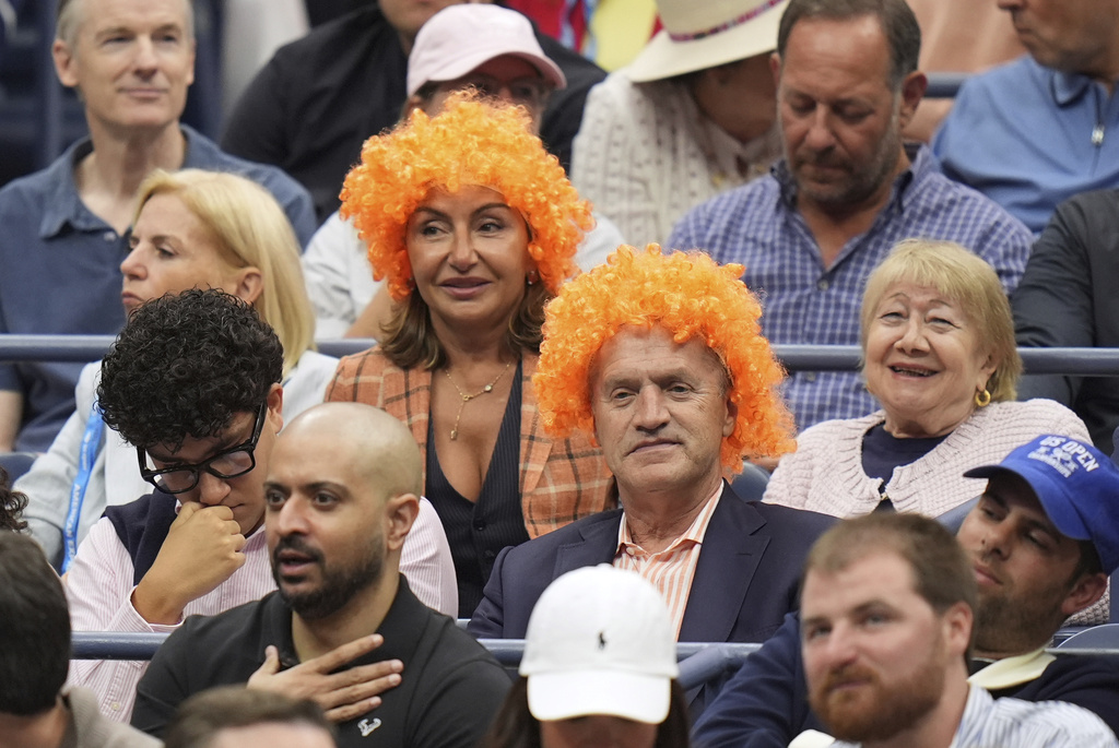 Fans attend the men's singles final of the U.S. Open tennis championships between Jannik Sinner, of Italy, and Carlos Alcaraz, of Spain, Sunday, Sept. 7, 2025, in New York. (AP Photo/Seth Wenig)