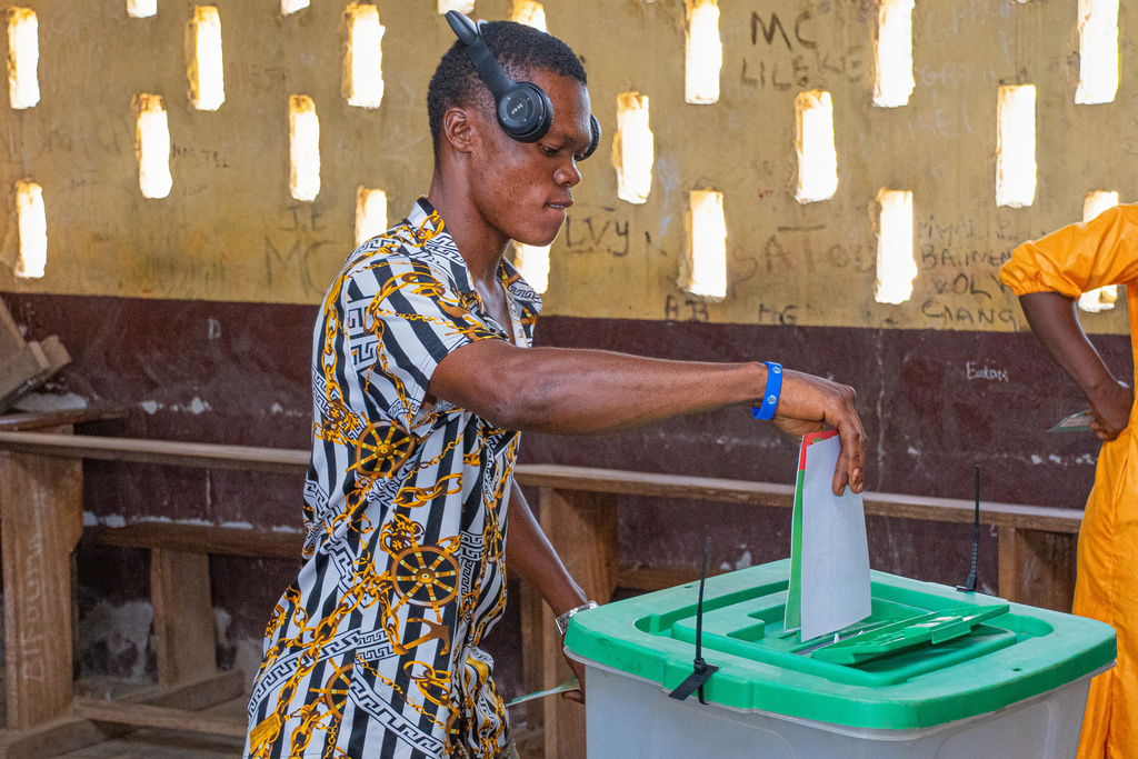 A voter cast his ballot at a polling station in Brazzaville, the Republic of Congo, Sunday, March 15, 2026. (AP Photo/Vivace Mambouana)