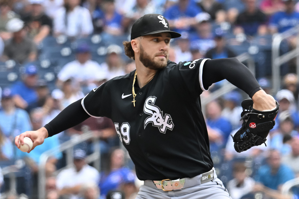 Chicago White Sox starting pitcher Sean Burke (59) throws to a Toronto Blue Jays batter during first inning MLB baseball action in Toronto on Sunday, July 19, 2026. (Jon Blacker/The Canadian Press via AP)