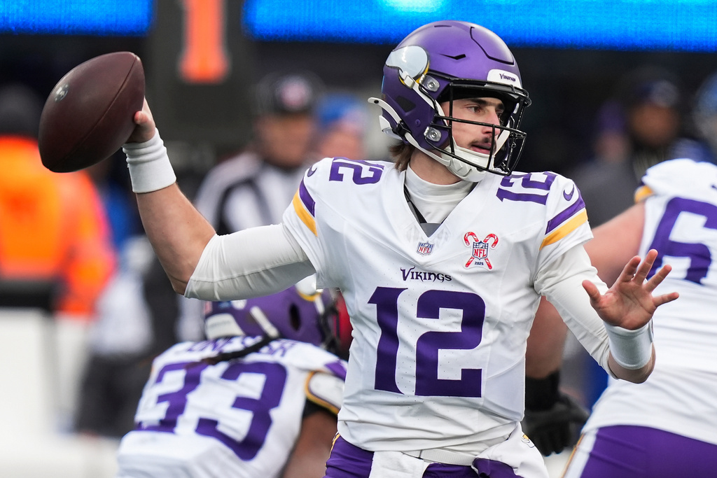 Minnesota Vikings quarterback Max Brosmer (12) passes against the New York Giants during the third quarter of an NFL football game, Sunday, Dec. 21, 2025, in East Rutherford, N.J. (AP Photo/Frank Franklin II)