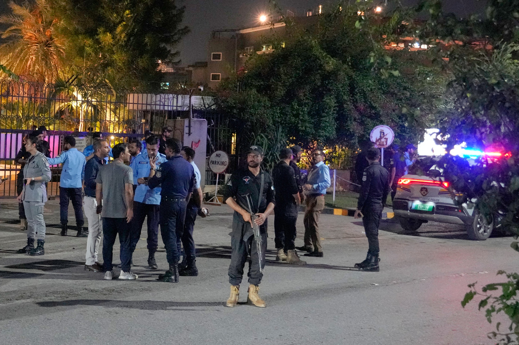 Police officers take a position outside the Shifa International Hospital, where imprisoned former Prime Minister Imran Khan will be transferred for a medical examination following Pakistan's Supreme Court order, in Islamabad, Pakistan, Thursday, Aug. 20, 2026. (AP Photo/Anjum Naveed)