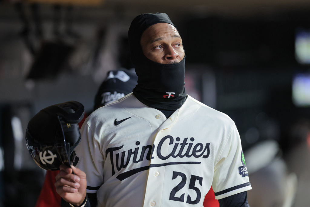Minnesota Twins' Byron Buxton (25) looks on after scoring a run during the fifth inning of a baseball game against the Detroit Tigers, Tuesday, April 7, 2026, in Minneapolis. (AP Photo/Bailey Hillesheim)