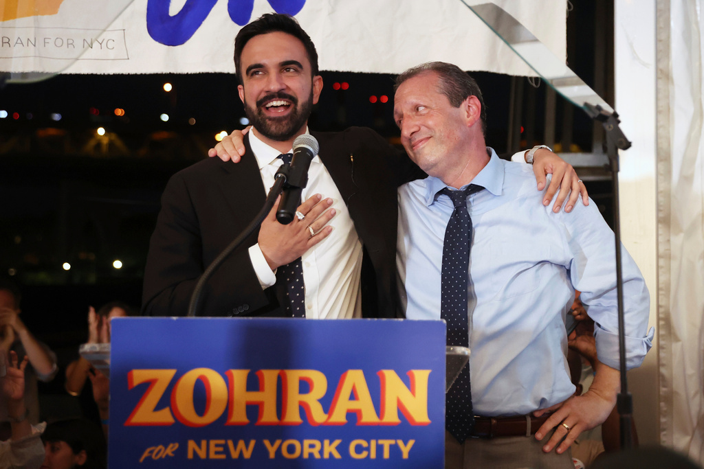 FILE - Democratic mayoral candidate Zohran Mamdani, left, speaks on stage with fellow candidate Comptroller Brad Lander at his primary election party, Wednesday, June 25, 2025, in New York. (AP Photo/Heather Khalifa, File)
