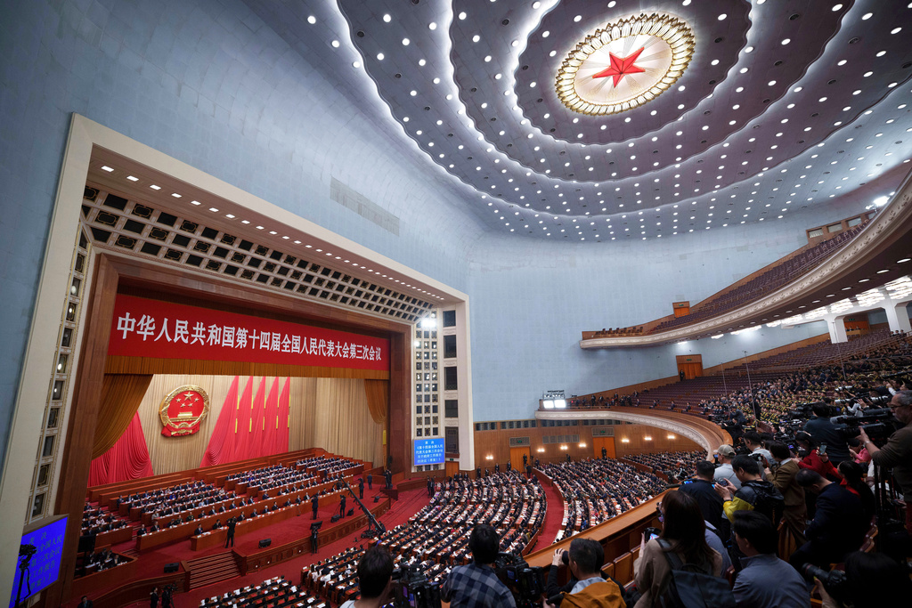 FILE - The closing session of the National People's Congress (NPC) is seen in the Great Hall of the People in Beijing on March 11, 2025. (AP Photo/Vincent Thian, File)