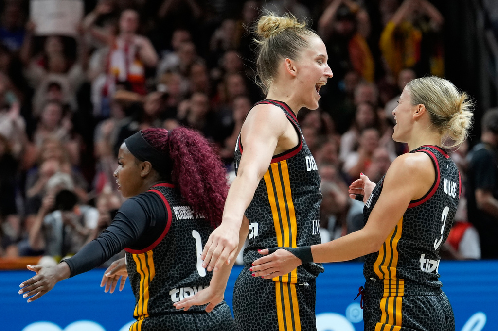 Germany's Leonie Fiebich, left, and Alexandra Wilke react during the Women's Basketball World Cup quarterfinal match between Germany and Belgium in Berlin, Thursday, Sept. 10, 2026. (AP Photo/Ebrahim Noroozi)
