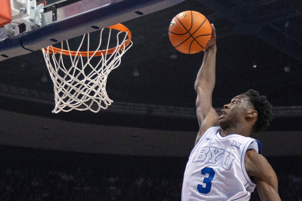 FILE - BYU forward AJ Dybantsa (3) prepares to dunk the ball against Eastern Washington during the first half of an NCAA college basketball game, Monday, Dec. 22, 2025, in Provo, Utah. (AP Photo/Rob Gray, File)