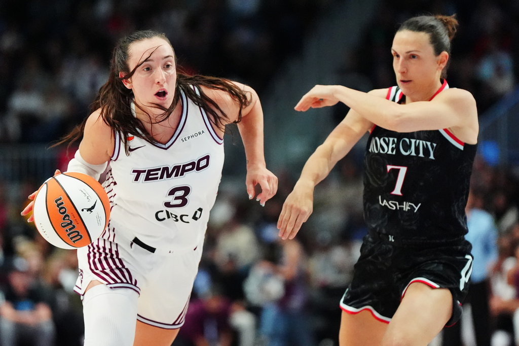 Toronto Tempo's Marina Mabrey (3) drives past Portland Fire's Teja Oblak (7) during the second half of a WNBA basketball game in Toronto, Saturday May 23, 2026. (Frank Gunn/The Canadian Press via AP)