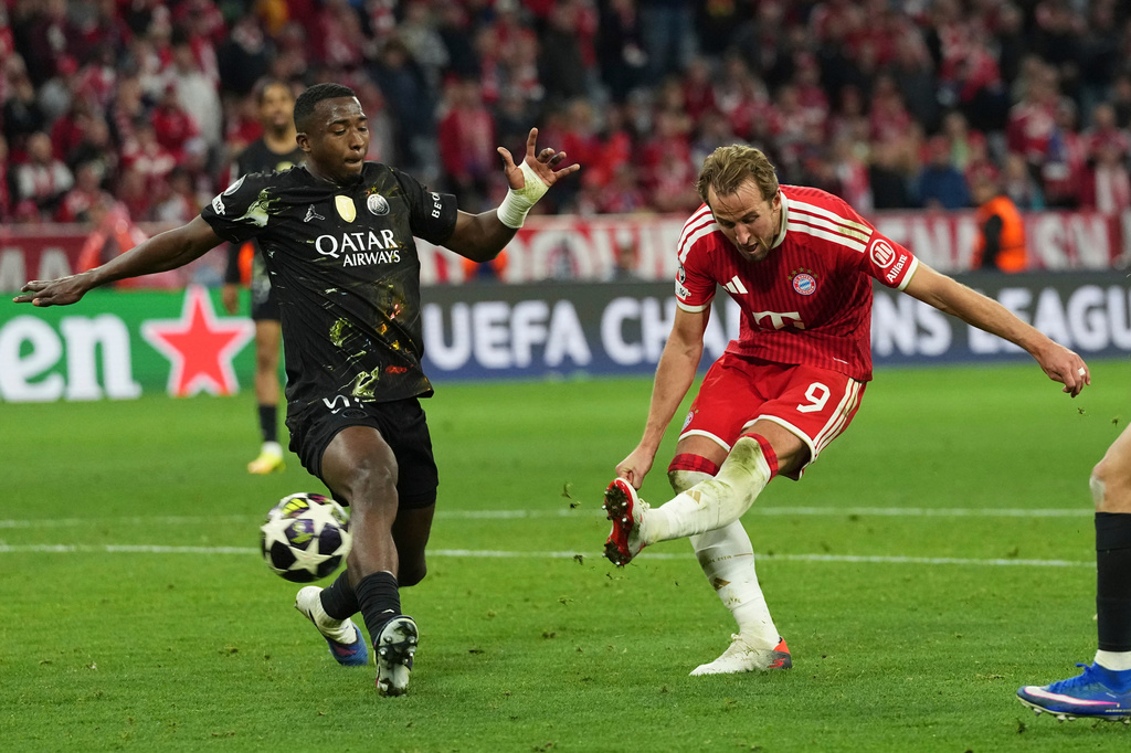 Bayern's Harry Kane scores his side's first goal during the Champions League semifinal second leg soccer match between Bayern Munich and Paris Saint Germain in Munich, Germany, Wednesday, May 6, 2026. (AP Photo/Martin Meissner)