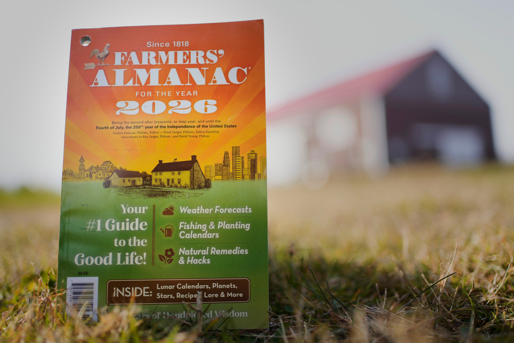 FILE -A copy of the final edition of the Farmers' Almanac is seen, Friday, Nov. 7, 2025, in Alexander, Maine. (AP Photo/Robert F. Bukaty)